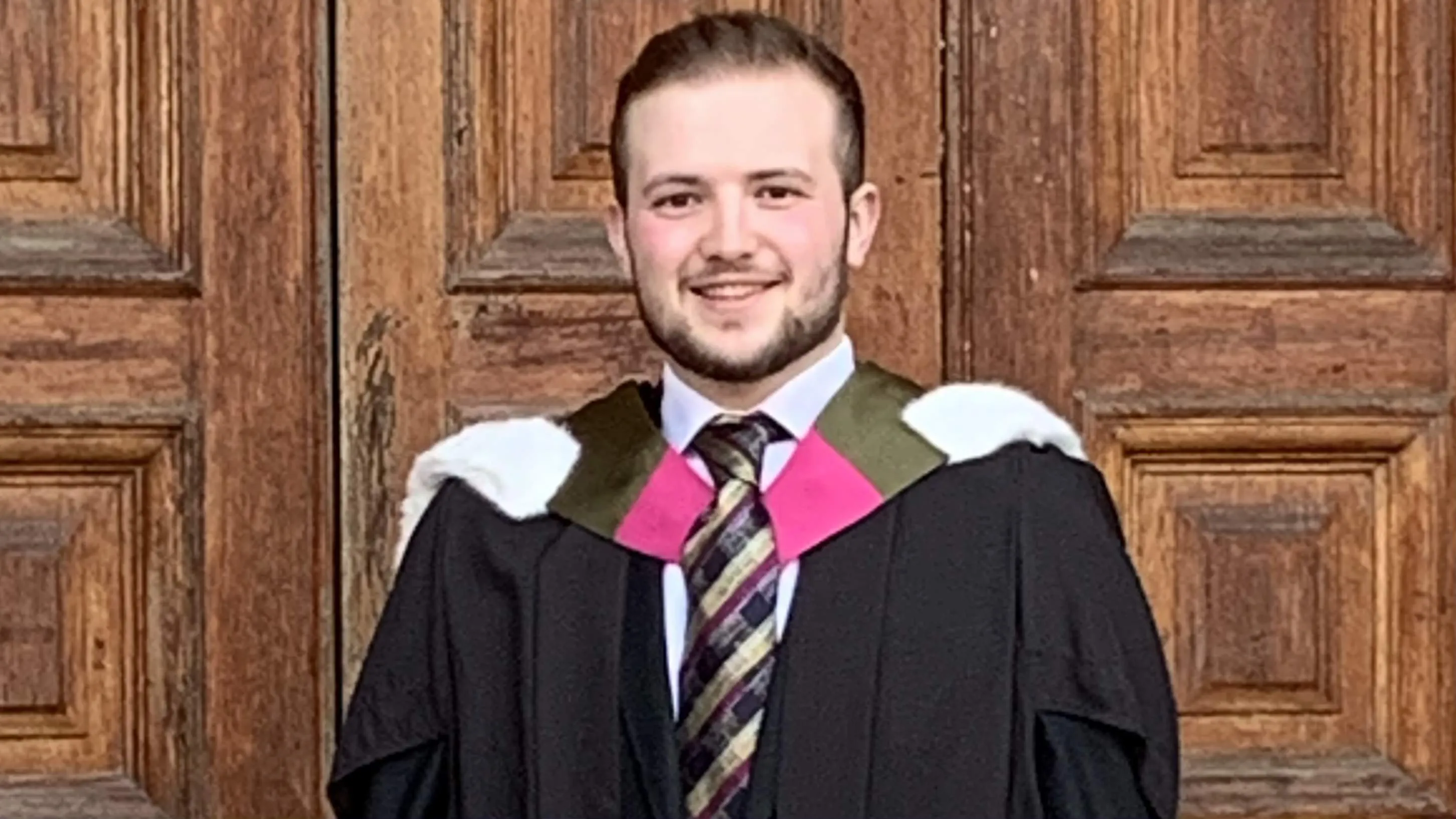 Man in graduation robes