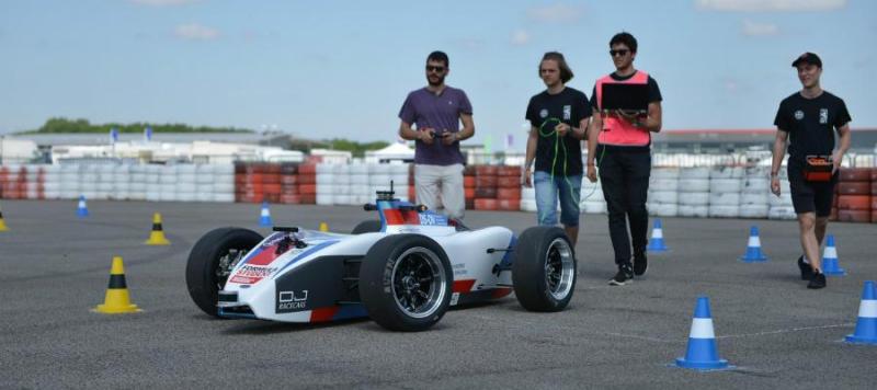 Edinburgh University Formula Student race car and students