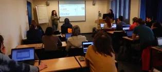 Students with laptops during a Coding Club workshop